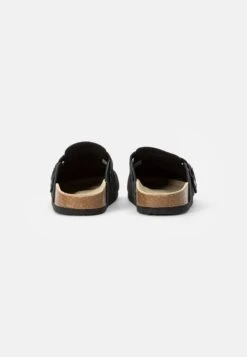Pier One Mules - Black 8 Pier One Mules - Black -Pier One 4d309a52050a4badb4012456e00dd92b scaled